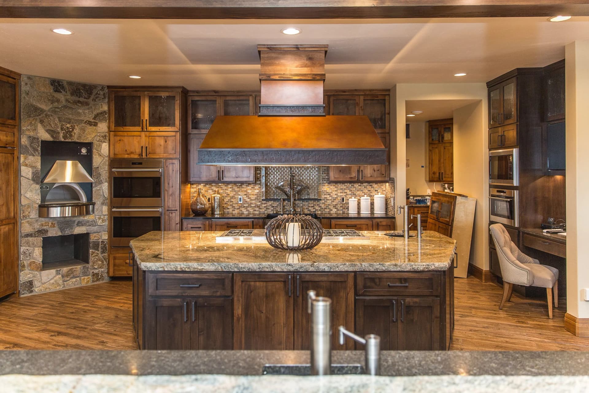 custom copper and steel range hood rustic luxury kitchen