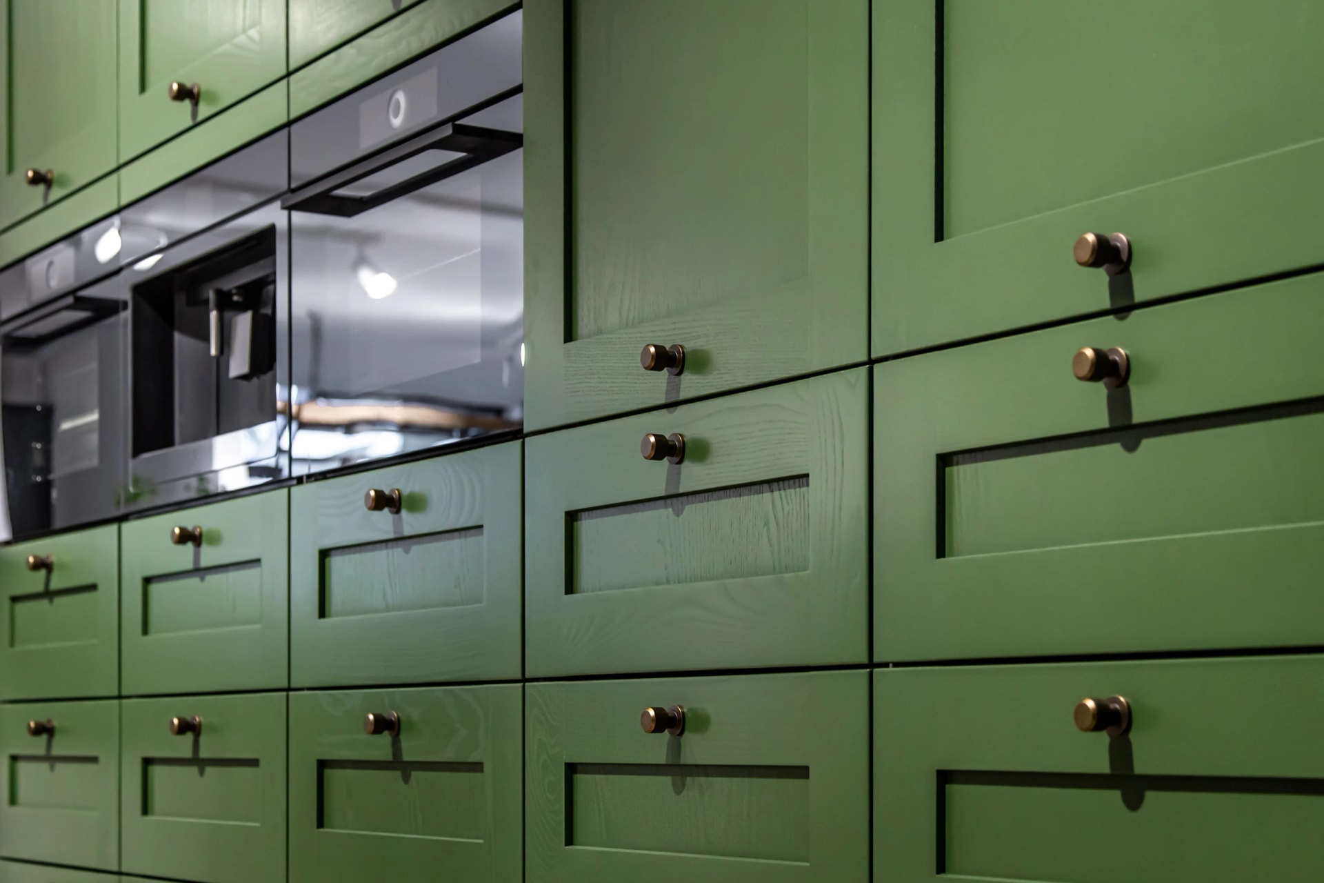 custom metal kitchen cabinetry hardware and integrated stainless appliances