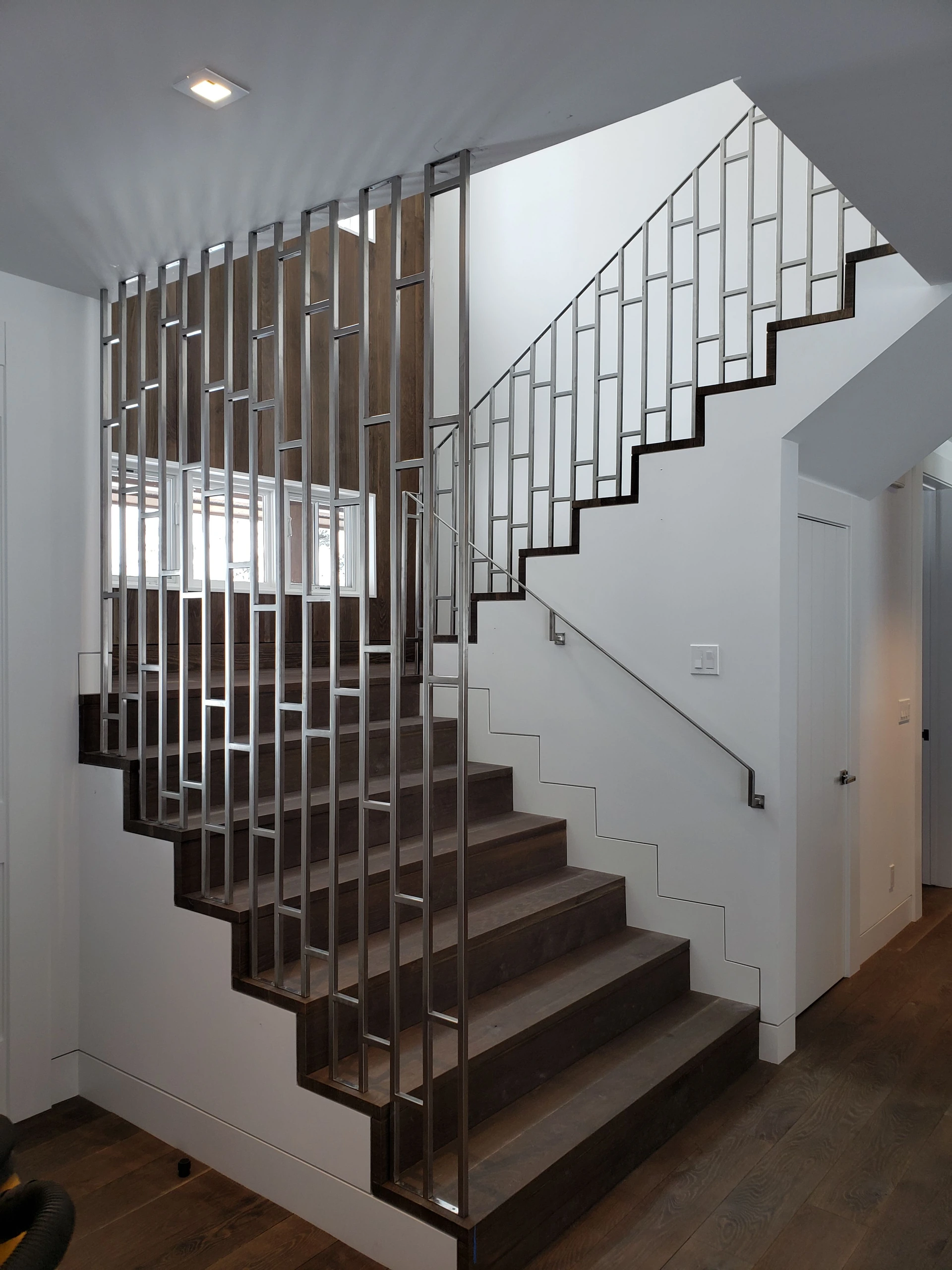 geometric stainless steel staircase railing architectural metal screen