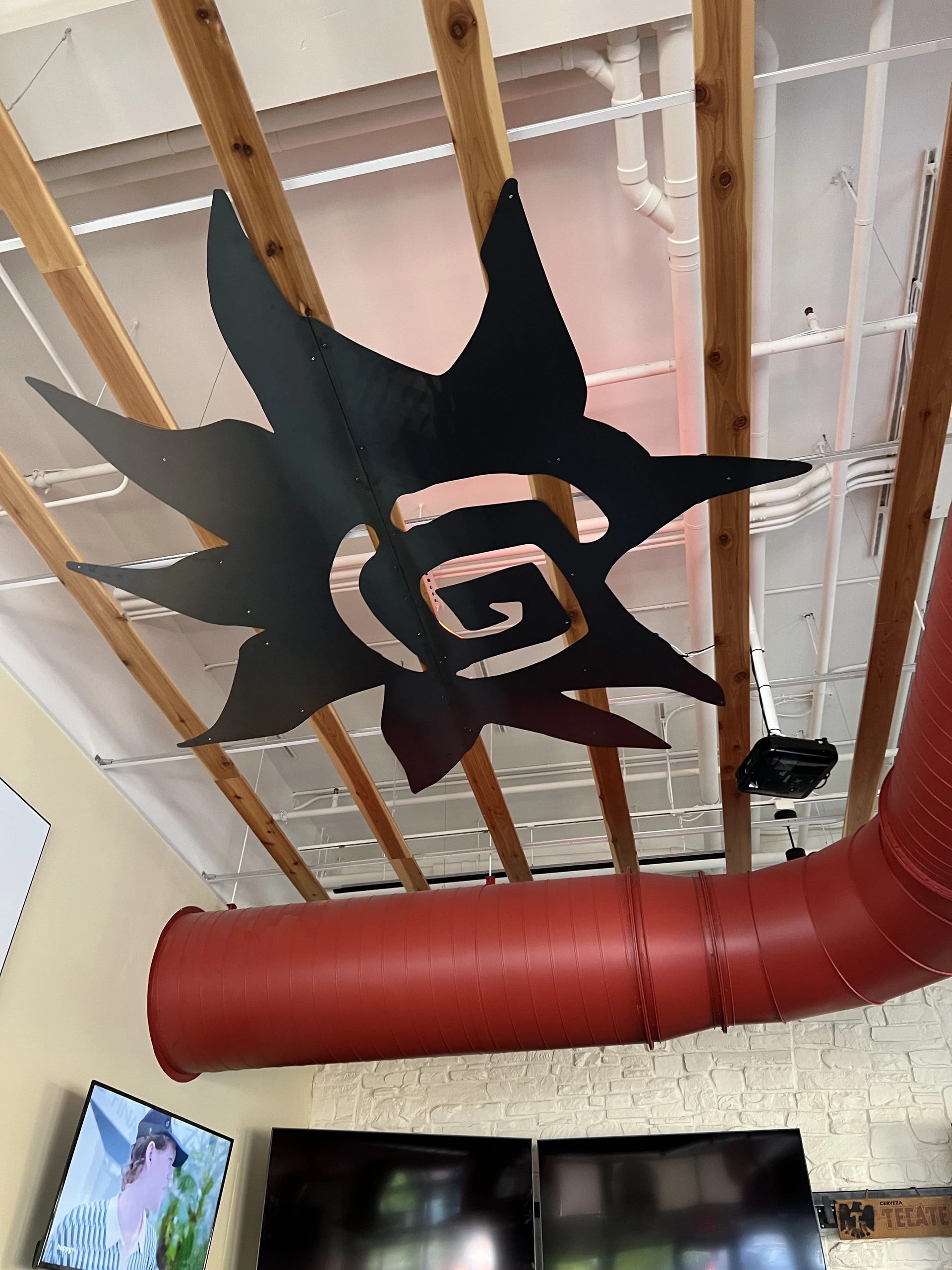 laser cut black sheet metal sun logo ornamental ceiling fabrication